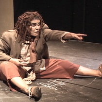 Photographs of the theatrical production, El enano en la botella