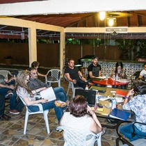 Photographs of the first reading for the theatrical production, Huevos