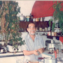 Abelardo Estorino cooking in his kitchen