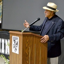 Photographs of Iván Acosta with students in St. Mary's Dominican High School