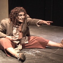 Photographs of the theatrical production, El enano en la botella