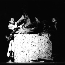 Photograph of Déxter Cápiro (Nicleto), Amarilys Núñez (Pilano), Mario Guerra (Dimanisio) and Grettel Trujillo (Zenón) in the production, "Los siervos"