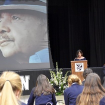 Photographs of Iván Acosta with students in St. Mary's Dominican High School