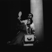 Photograph of Déxter Cápiro (Orestes Garrigó) and Amarilys Núñez (Clitemnestra) in the production, "Electra Garrigó"