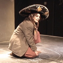 Photographs of the theatrical production, El enano en la botella