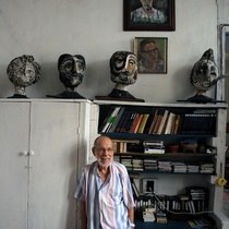 Photographs of Abelardo Estorino with Antonia Eiriz's Heads