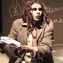 Photographs of the theatrical production, El enano en la botella