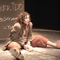 Photographs of the theatrical production, El enano en la botella