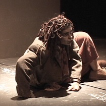 Photographs of the theatrical production, El enano en la botella