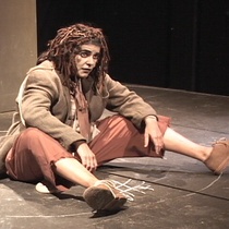 Photographs of the theatrical production, El enano en la botella