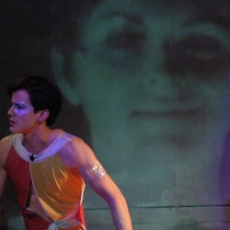 Photograph of the theatrical production, Iphigenia Crash Land Falls on the Neon Shell That Was Once Her Heart (A Rave Fable)