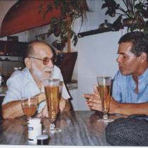 Photograph of Abelardo Estorino and Reinaldo Montero at Estorino's home, Havana